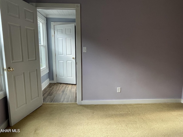 unfurnished room featuring hardwood / wood-style floors