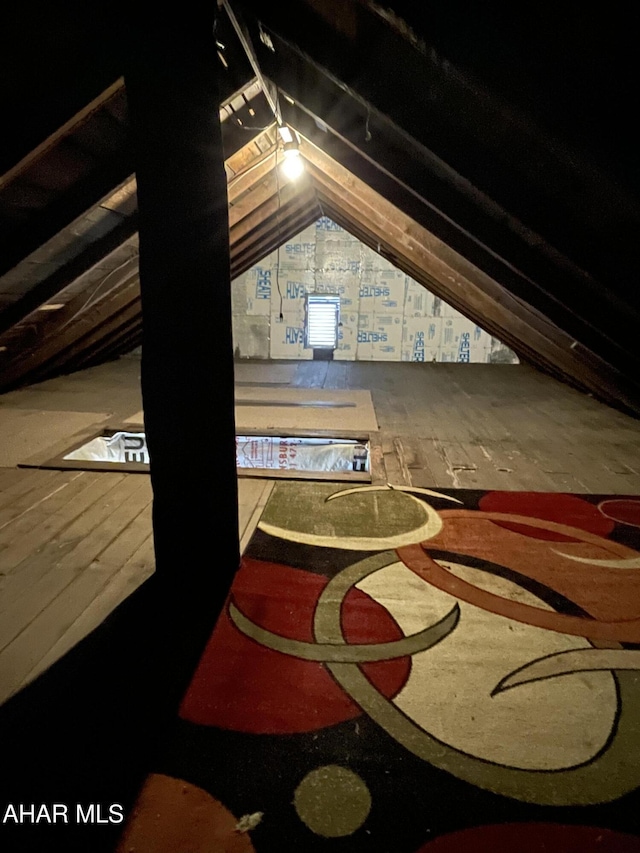 view of unfinished attic