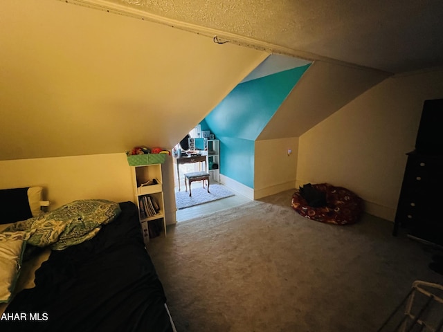 bedroom with lofted ceiling and carpet