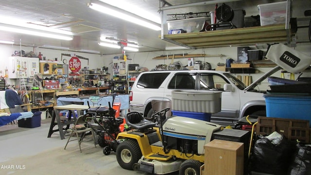 garage featuring a workshop area