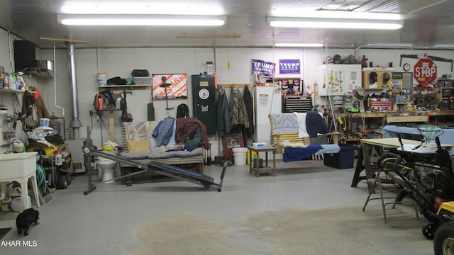 garage featuring a workshop area