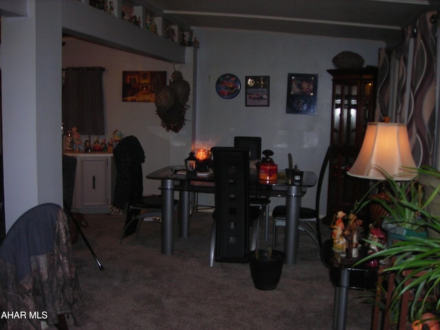 dining area featuring carpet