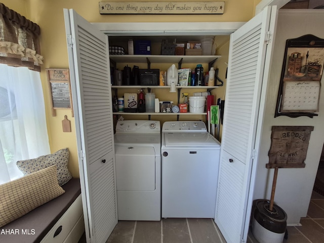 605 13th St, Duncansville, PA 16635 - laundry room featuring laundry area, dark tile patterned flooring, and washing machine and clothes dryer