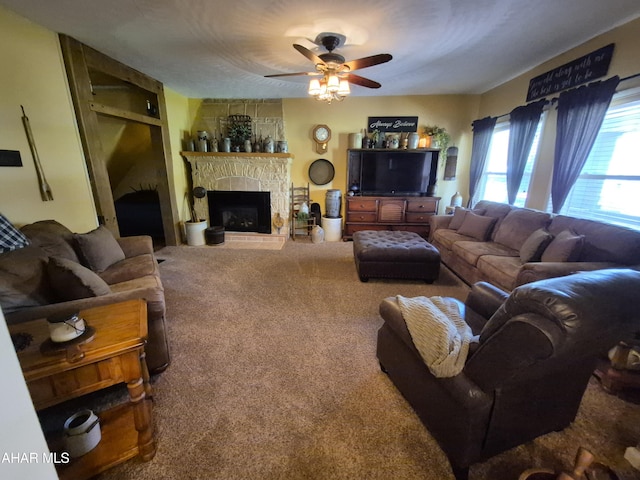 605 13th St, Duncansville, PA 16635 - living area featuring carpet flooring, ceiling fan, and a stone fireplace