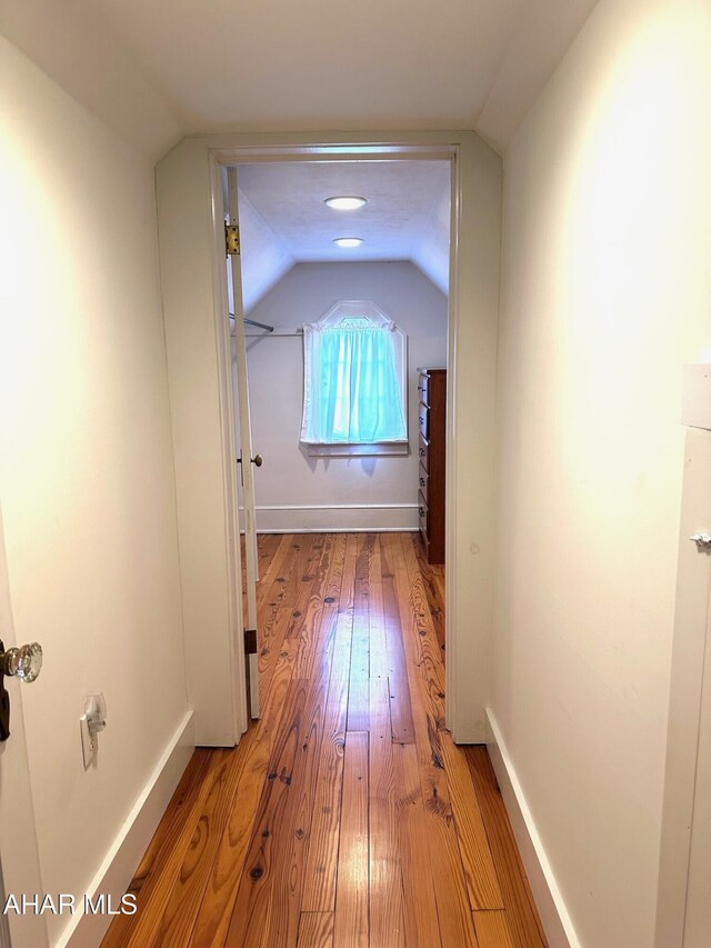 132 S Thomas St, Bedford, PA 15522 - corridor featuring lofted ceiling and light wood-style flooring