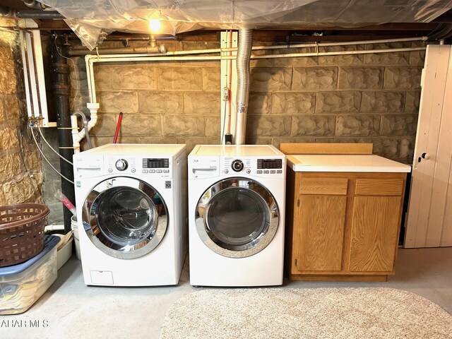 132 S Thomas St, Bedford, PA 15522 - washroom featuring washer and dryer and cabinet space