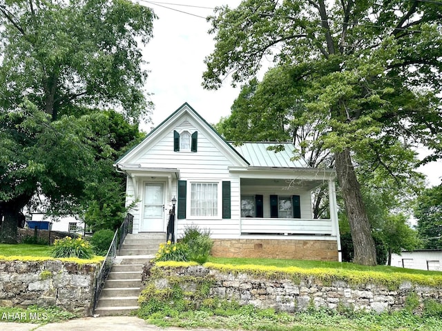 132 S Thomas St, Bedford, PA 15522 - view of front of house featuring covered porch and crawl space