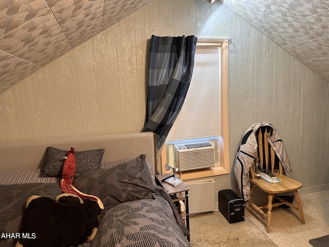 bedroom featuring cooling unit and lofted ceiling