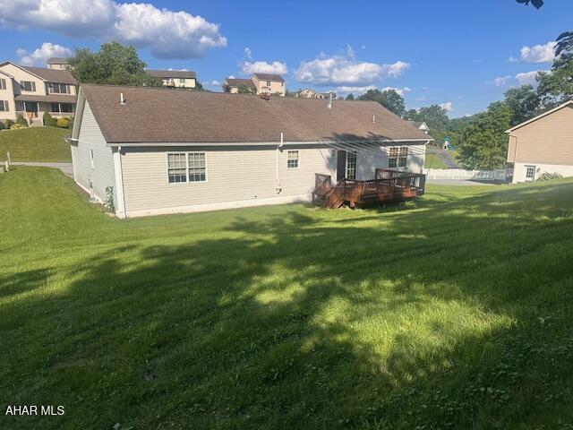 116 Estate Dr, Duncansville, PA 16635 - rear view of house featuring a yard and a wooden deck