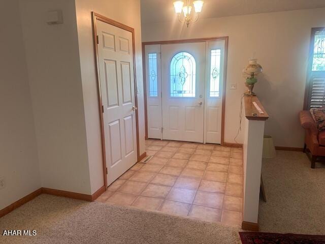 116 Estate Dr, Duncansville, PA 16635 - entryway with light colored carpet and a chandelier