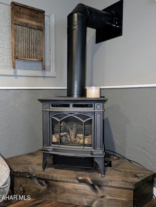 interior details featuring a wood stove