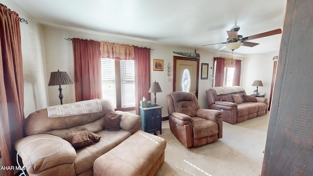 living room with ceiling fan and light carpet