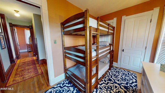 bedroom featuring wood-type flooring