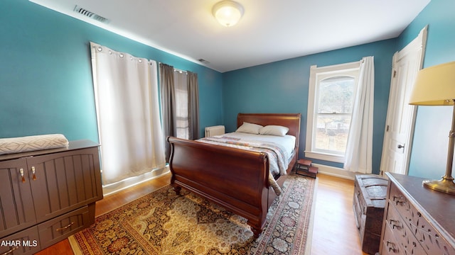 bedroom featuring light wood-type flooring