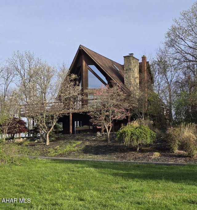 116 Scenic Knoll Dr, Hollidaysburg, PA 16648 - view of side of property featuring a chimney, a deck, and a lawn