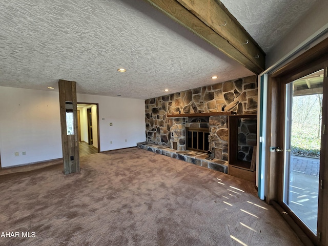 116 Scenic Knoll Dr, Hollidaysburg, PA 16648 - unfurnished living room featuring recessed lighting, carpet, a stone fireplace, baseboards, and a textured ceiling