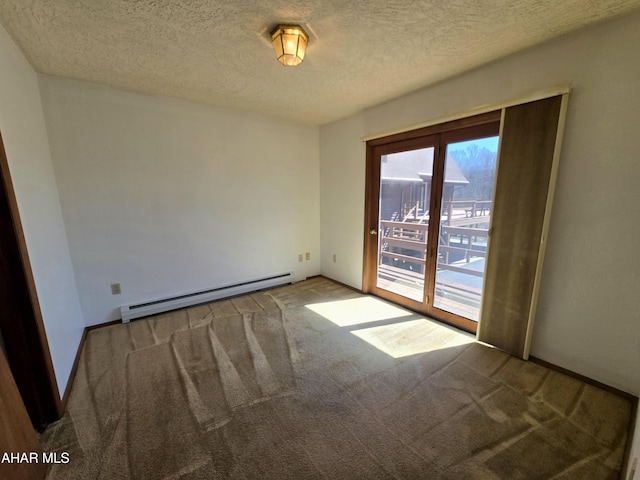 116 Scenic Knoll Dr, Hollidaysburg, PA 16648 - spare room featuring a baseboard heating unit, a textured ceiling, and carpet flooring