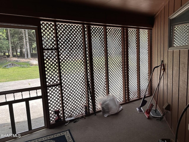 interior space featuring wooden walls