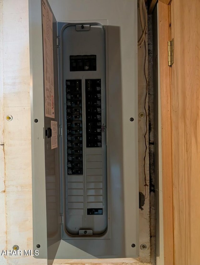 utility room featuring electric panel