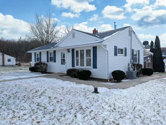 ranch-style home featuring central AC