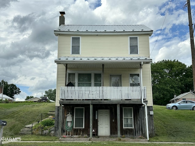 3785 Brumbaugh Rd, New Enterprise, PA 16664 - multi unit property featuring a front yard, a metal roof, and a chimney