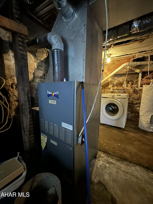 3785 Brumbaugh Rd, New Enterprise, PA 16664 - utility room featuring washer / dryer and heating unit