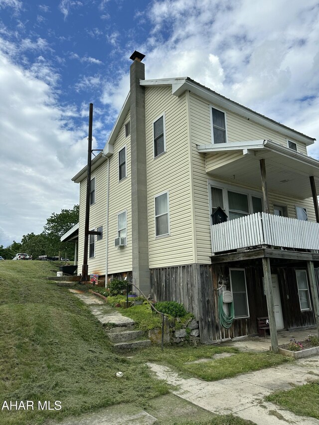 3785 Brumbaugh Rd, New Enterprise, PA 16664 - view of property exterior featuring a chimney and cooling unit