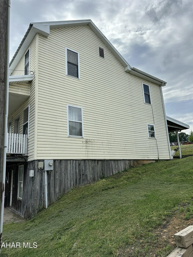 3785 Brumbaugh Rd, New Enterprise, PA 16664 - view of side of home with a yard