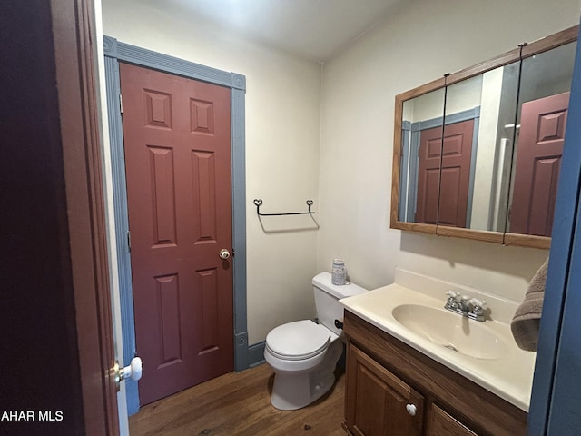 217 Good Shepherd Rd, Altoona, PA 16601 - bathroom featuring toilet, vanity, and wood finished floors