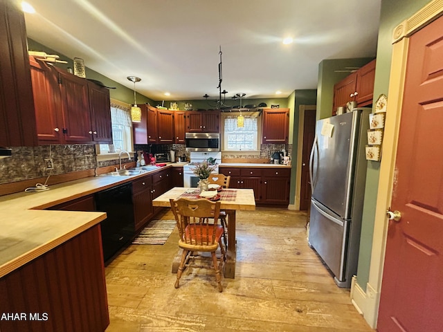 217 Good Shepherd Rd, Altoona, PA 16601 - kitchen with decorative backsplash, light countertops, a sink, and appliances with stainless steel finishes