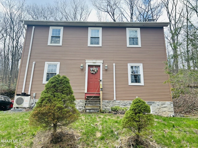 217 Good Shepherd Rd, Altoona, PA 16601 - colonial house featuring a front lawn and ac unit