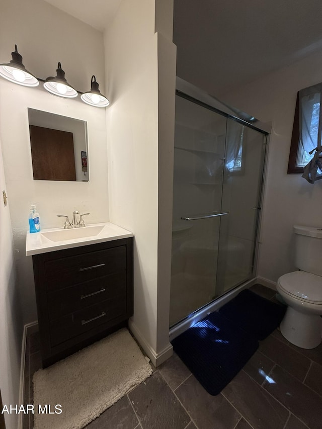 229 Celtic Ln, Altoona, PA 16601 - bathroom with vanity, baseboards, a shower stall, and toilet