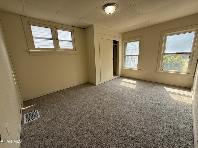 316 3rd Ave, Altoona, PA 16602 - unfurnished bedroom with a drop ceiling, a closet, and carpet flooring