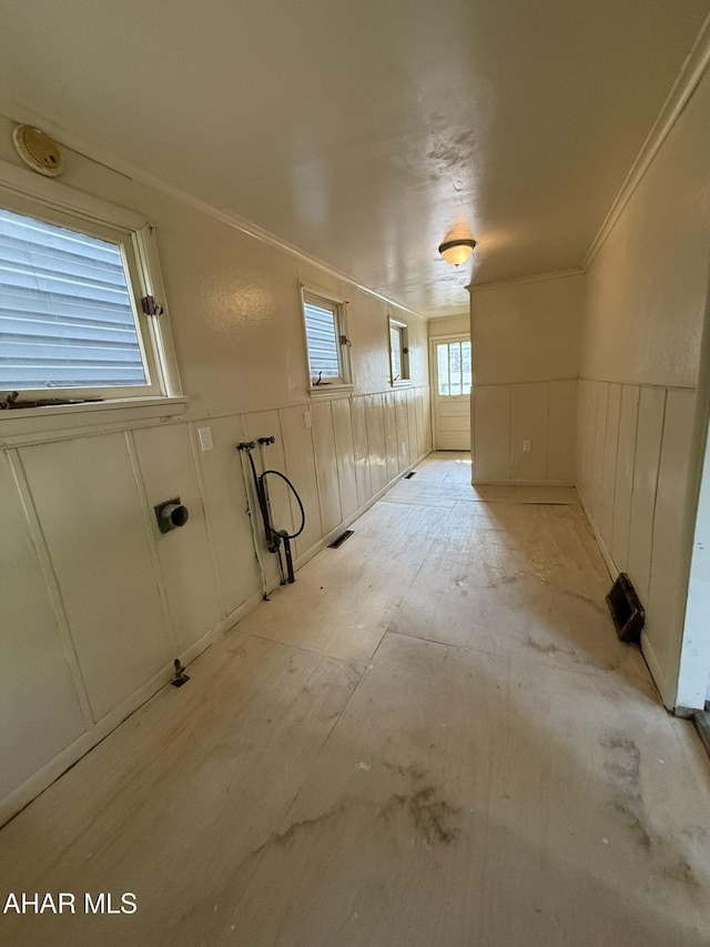 316 3rd Ave, Altoona, PA 16602 - below grade area with a decorative wall, a wainscoted wall, and ornamental molding
