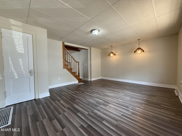 316 3rd Ave, Altoona, PA 16602 - spare room with a drop ceiling, stairs, and dark wood-style floors