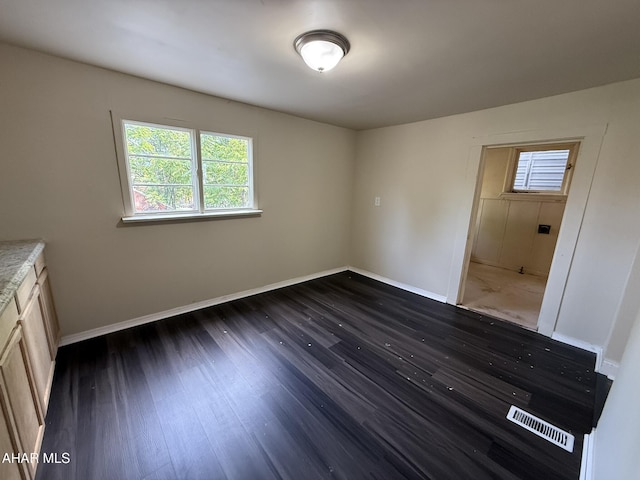 316 3rd Ave, Altoona, PA 16602 - unfurnished room featuring dark wood-style flooring and baseboards