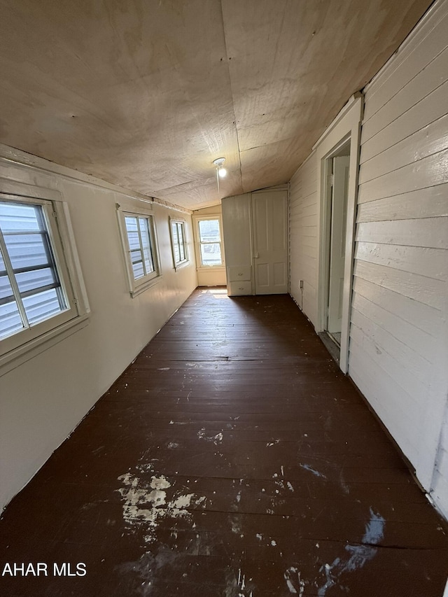 316 3rd Ave, Altoona, PA 16602 - unfurnished room featuring wood walls and hardwood / wood-style floors