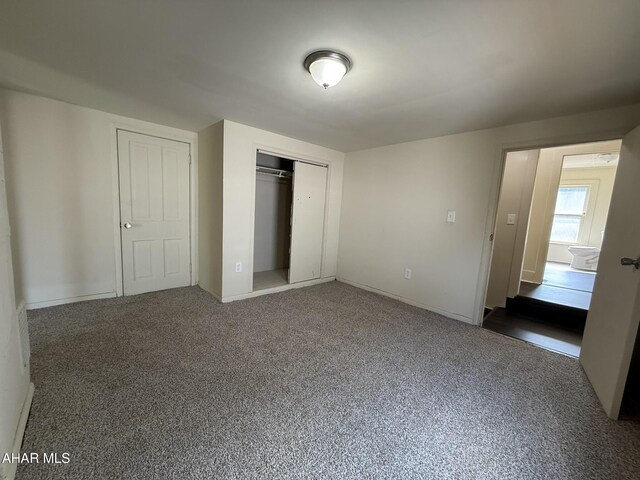 316 3rd Ave, Altoona, PA 16602 - unfurnished bedroom featuring a closet and baseboards