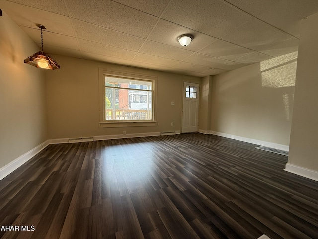 316 3rd Ave, Altoona, PA 16602 - unfurnished room featuring a drop ceiling and dark wood-style floors