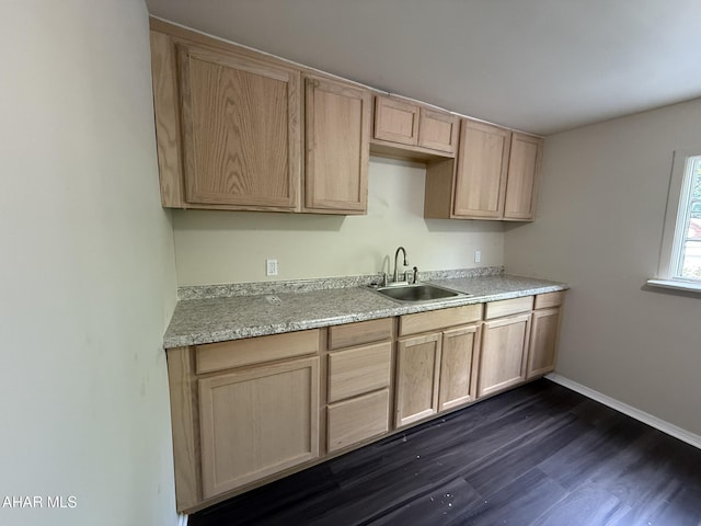 316 3rd Ave, Altoona, PA 16602 - kitchen with light brown cabinets, light countertops, and dark wood-style flooring