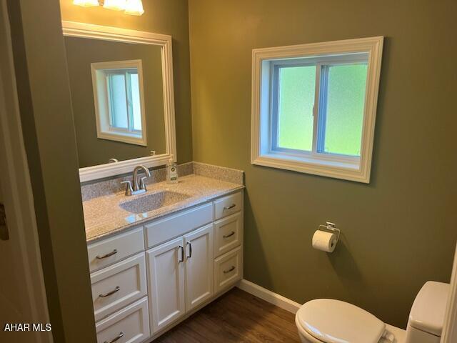 208 W 5th Ave, Everett, PA 15537 - bathroom with vanity and wood finished floors