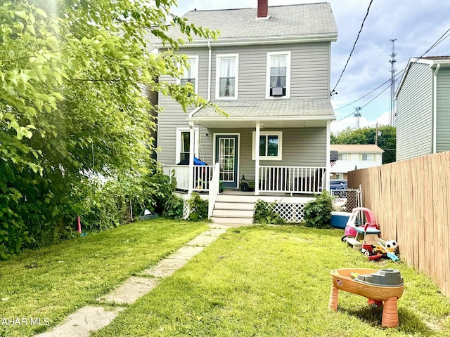 311 E Bell Ave, Altoona, PA 16602 - back of house with a chimney and a porch