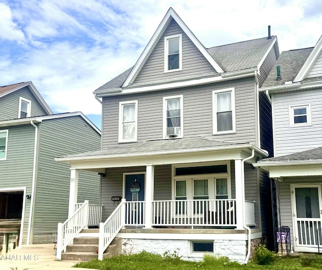 311 E Bell Ave, Altoona, PA 16602 - view of front of house with covered porch and cooling unit