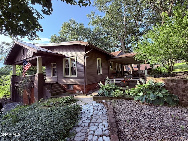 4815 6th Ave, Altoona, PA 16602 - view of side of property with covered porch and a patio area