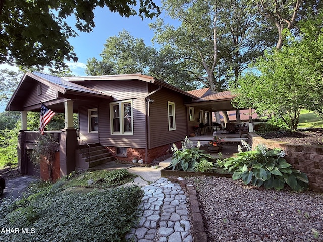 4815 6th Ave, Altoona, PA 16602 - view of front of home with a patio and a metal roof