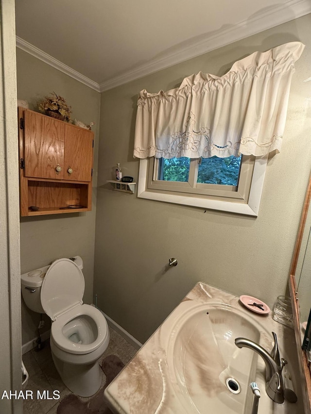 4815 6th Ave, Altoona, PA 16602 - bathroom with ornamental molding, tile patterned flooring, and vanity