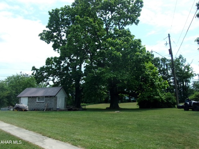 3752 Main Rd, Bedford, PA 15522 - view of green lawn featuring an outbuilding