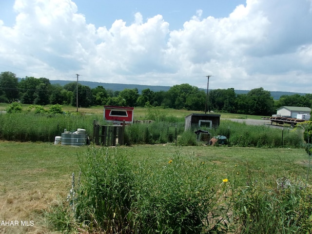 3752 Main Rd, Bedford, PA 15522 - view of yard with a storage unit and a view of countryside
