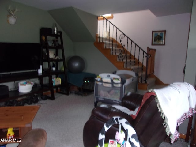 3752 Main Rd, Bedford, PA 15522 - living area with carpet floors, stairway, and lofted ceiling