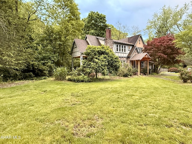 5 Log Cabin Ct, Altoona, PA 16602 - view of front of home featuring a front lawn and a chimney